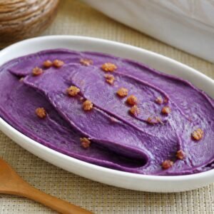 Smooth Filipino ube halaya purple yam jam topped with latik.