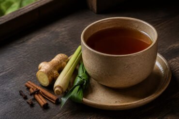Indonesian bandrek ginger drink with lemongrass, pandan, cinnamon, and cloves.