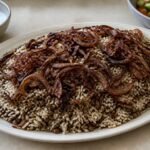Lebanese lentils and rice topped with deeply caramelized onions.