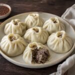 Steamed Mongolian buuz dumplings filled with beef and lamb.