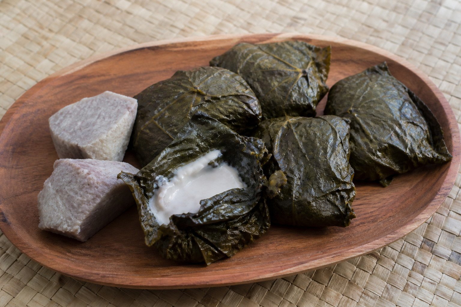 Samoan palusami parcels served with cooked taro.