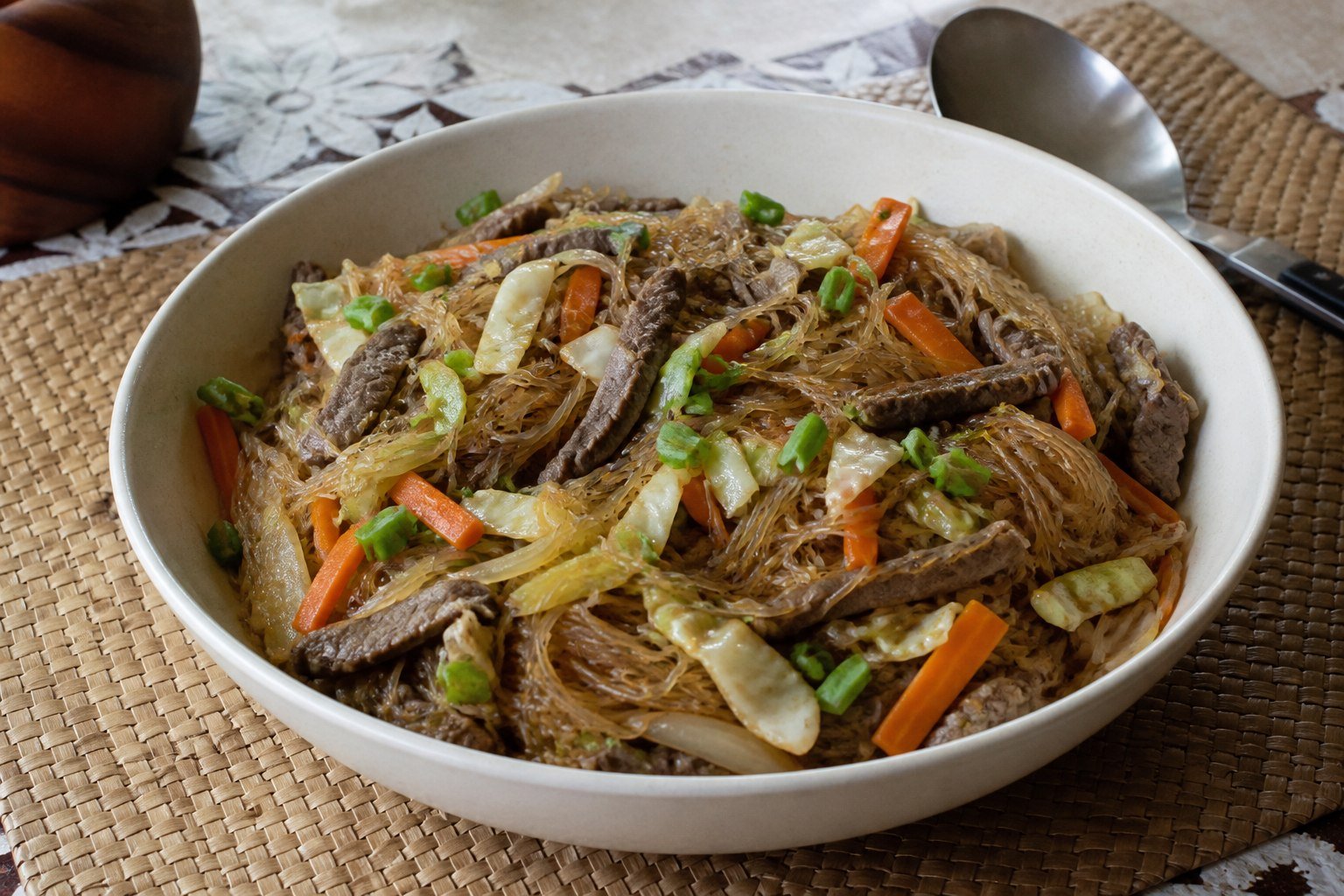 Samoan sapasui glass noodles with beef, cabbage, carrot, celery, onion, and scallions.