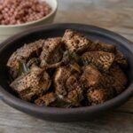 Sri Lankan fish ambul thiyal coated in a dark sour pepper spice paste.