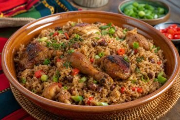 Trinidadian Pelau with caramelized chicken, pigeon peas, coconut rice, peppers, and scallions.