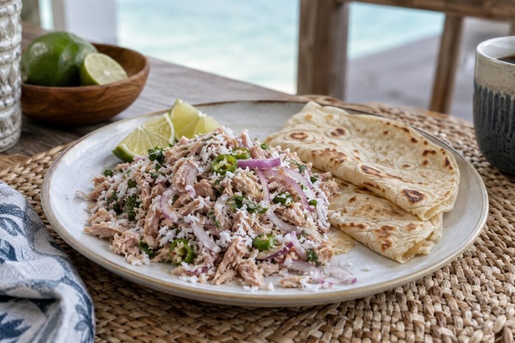 Maldivian mas huni made with flaked tuna, coconut, onion, chili, and lime served with flatbread.